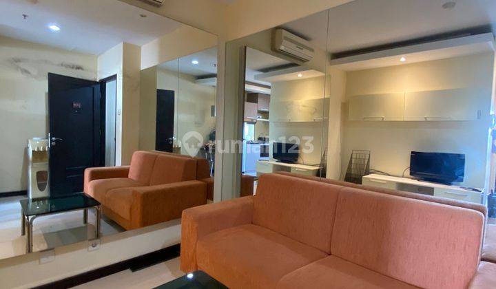 Disewakan Apartemen Cosmo Mansion 1 Bedroom Lantai Tengah Furnished 1