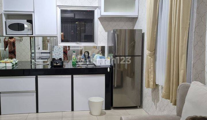 Disewakan Apartemen Cosmo Residence 2 Bedroom Lantai Tengah Furnished 2