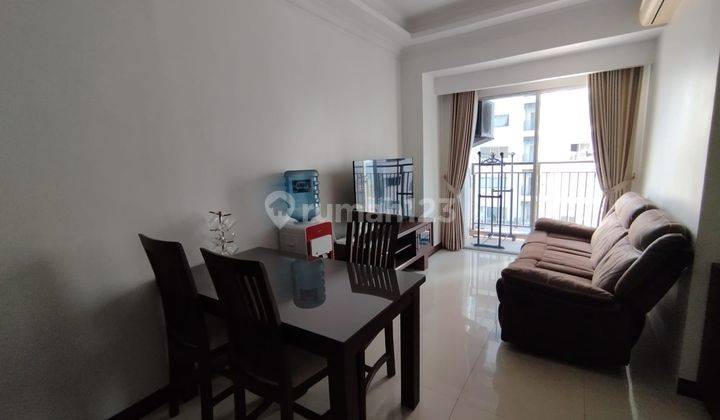 Disewakan Apartemen Cosmo Mansion 2 Bedroom Lantai Sedang Furnished 1