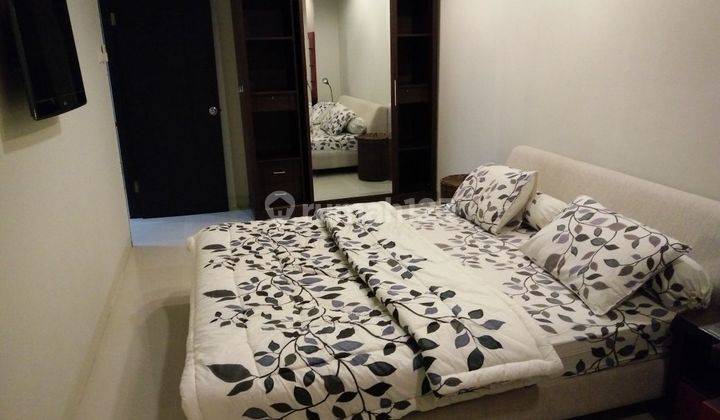 Disewakan Apartemen Cosmo Mansion 2 Bedroom Lantai Sedang Furnished 1