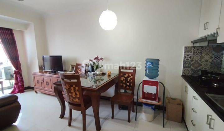 Dijual Apartemen Cosmo Mansion 2 Bedroom Lantai Tinggi Furnished 1