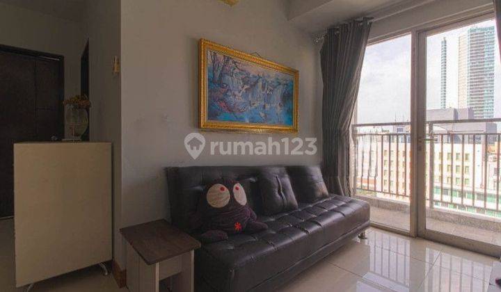 Disewakan Apartemen Cosmo Mansion 2 Bedroom Lantai Tengah Furnished 1