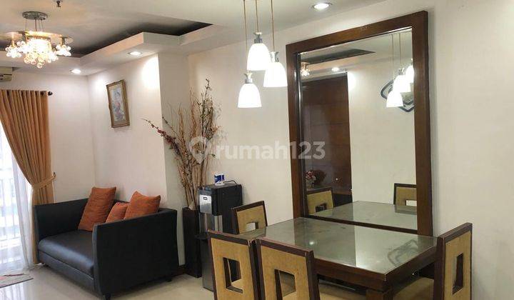 Disewakan Apartemen Cosmo Mansion 3 Bedroom Lantai Tengah Furnished 1