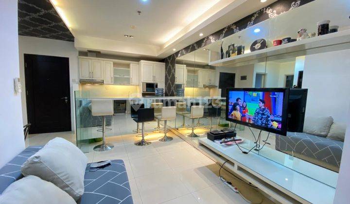 Jual Apartemen Cosmo Mansion 2 Bedroom Lantai Tengah 1