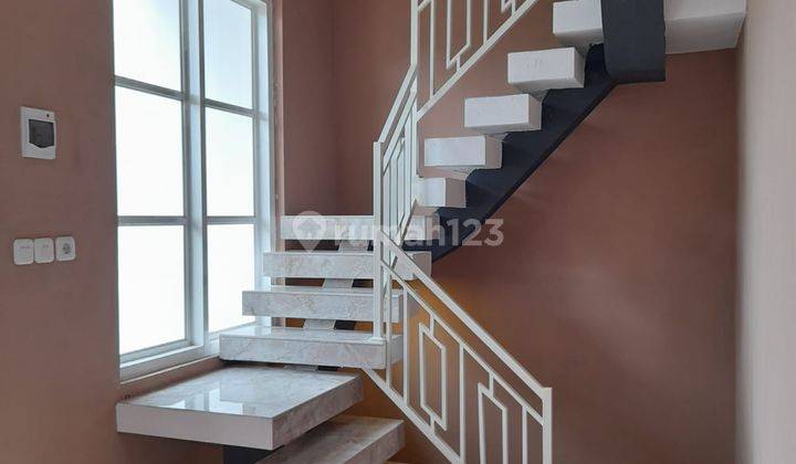Rumah Modern Siap Huni di Jl. Atletik Tasikmadu 10