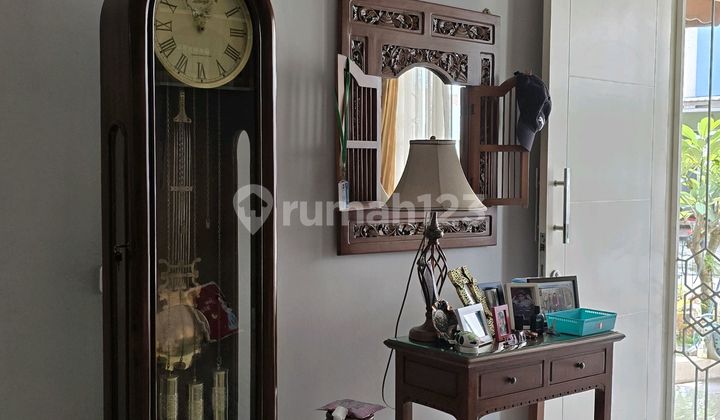 The House is Renovated, Semi-Furnished, Neat, with a Verdant View at The Icon BSD.