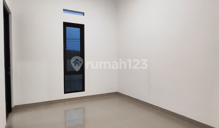 2-Storey House with Modern Balinese Design, Strategically Located Near Cijago Toll Road 2