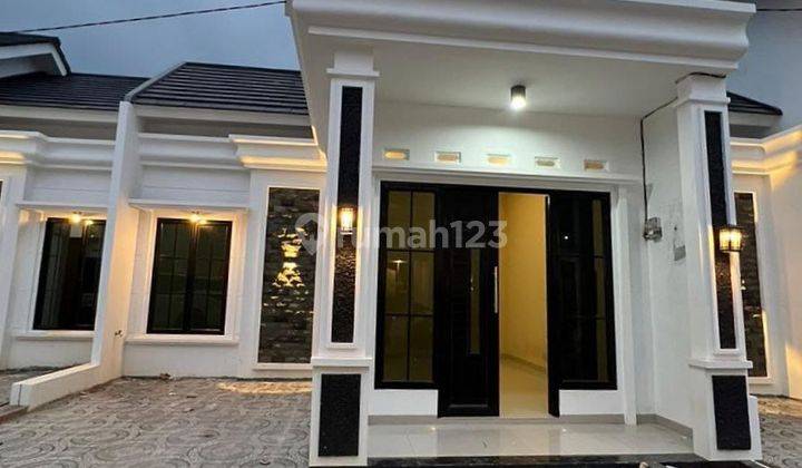 Rumah murah minimalis akses 2 mobil 10 menit ke stasiun Depok 1