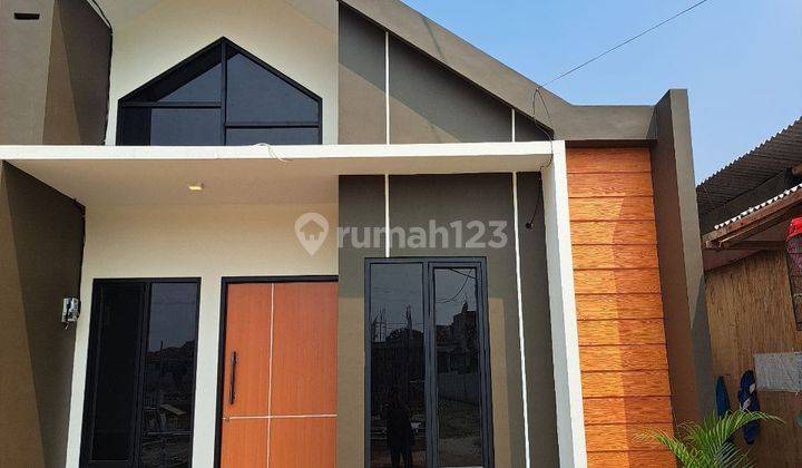 Rumah murah akses 2 mobil dekat exit Tol Sawangan Margonda Depok 1