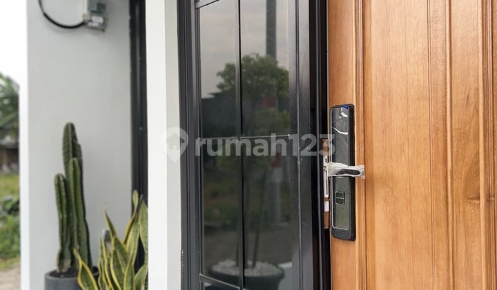 teras rumah keren akses 2 mobil