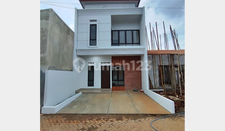 2-Storey House with Modern Balinese Design, Strategically Located Near Cijago Toll Road 1