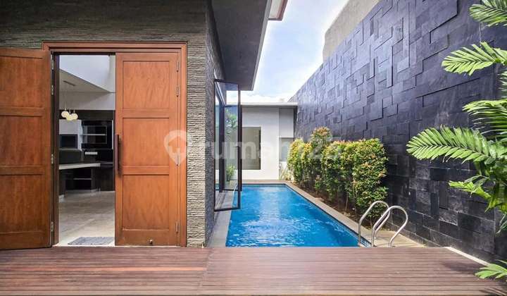 Modern Tropical Design with Spacious Yard, Wide Road, Flood-Free in Kemang