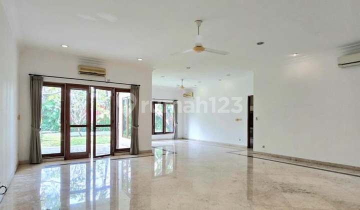 House with Spacious Green Yard Equipped with Swimming Pool in Kemang 2
