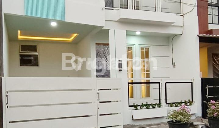 A good minimalist new house in the Menganti housing estate, West Gresik, Surabaya. 2