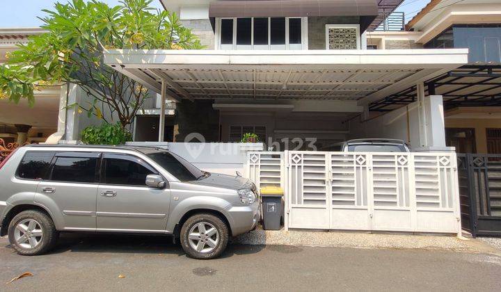 Rumah Modern Mewah Siap Huni di Pondok Kelapa 1