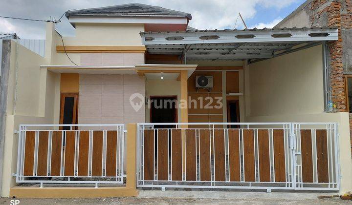 RUMAH CANTIK MINIMALIS SIAP HUNI -- HARGA SUPER EKONOMIS DI DALAM PERUMAHAN GRIYA TAMANAN INDAH DEKAT GIWANGAN