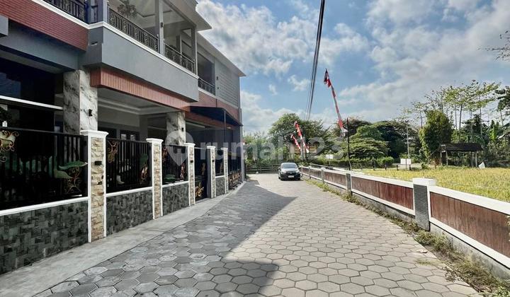 Luxurious 2-Story House with Large Land, Swimming Pool, Green Rice Field View in Maguwoharjo, Depok, Sleman, Close to Instiper Campus 2