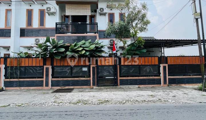 Strategic 2-Storey Luxurious House - Fully Furnished Paddy Field View in Wedomartani, Ngemplak, Sleman, Near Maguwo Stadium.