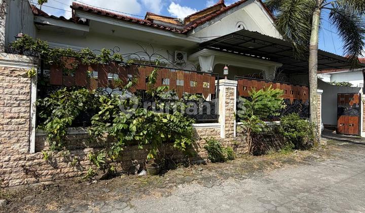 Luxury Green Semi-Furnished House with Spacious Land in Maguwoharjo, Near Lottemart and Hermina Hospital. 2