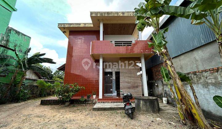 DIJUAL RUMAH BONUS BENGKEL JALAN ABDUL ROZAK CELENTANG PALEMBANG 1