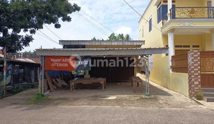 For Sale House with Spacious Yard, Bonus of Boarding Houses, Sukabangun, Palembang