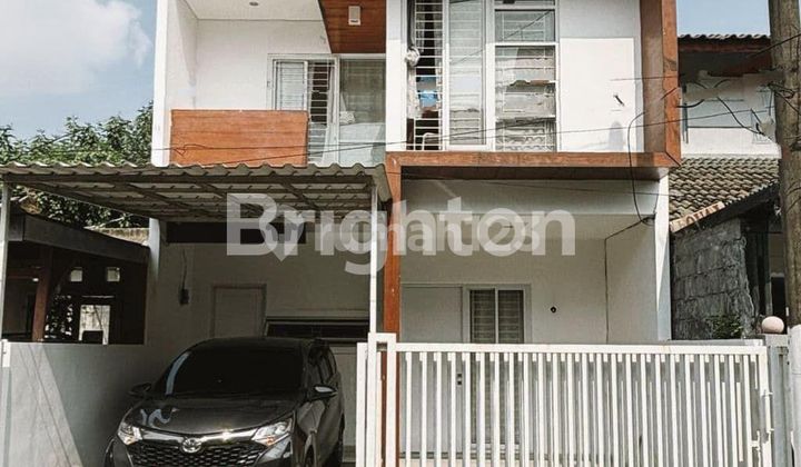 rumah cantik minimalis di graha raya 