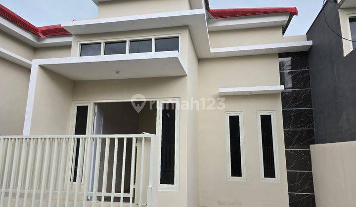 Rumah cantik DP minim Rungkut jalan lebar