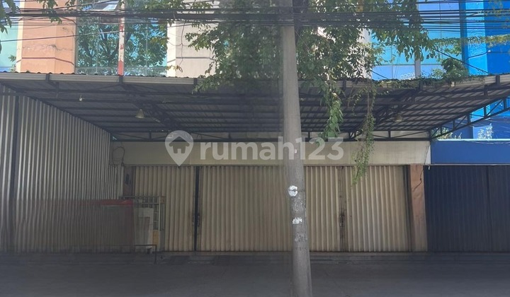 2 connected shop-house units in Dukuh Kupang Barat near Mayjen Sungkono, close to UWKS campus.