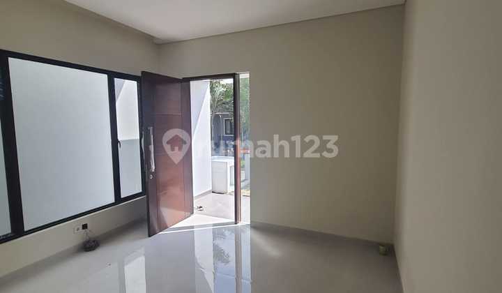 Affordable New Minimalist House in Woodland Citraland, West Surabaya 2