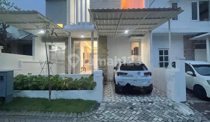 Rumah Taman Puspa Raya Citraland Baru Renov Semi Furnish