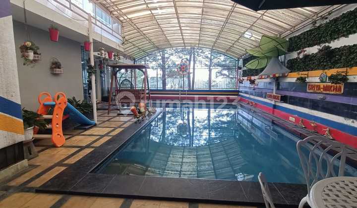 House with Back View to Pine Forest, Spacious Swimming Pool in Hill Top Cluster, Sentul City Bogor.