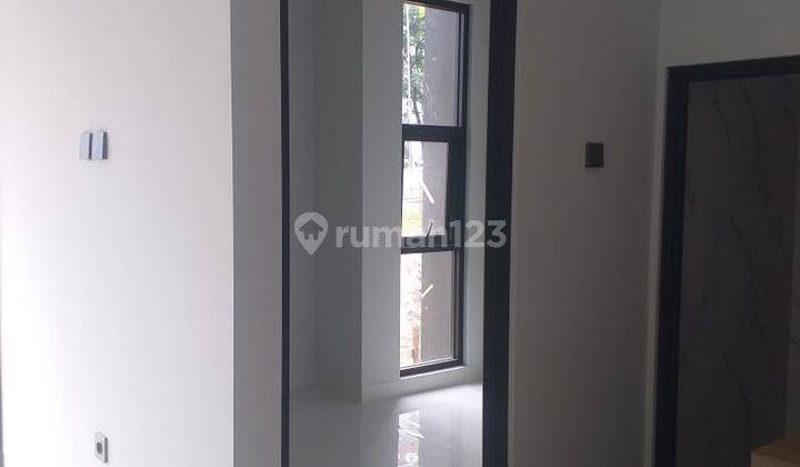Rumah Mewah Pinggir Jalan Raya 5 Menit Tol Borr 9