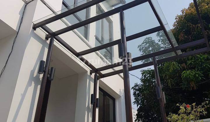 Rumah modern minimalis di permata hijau 1