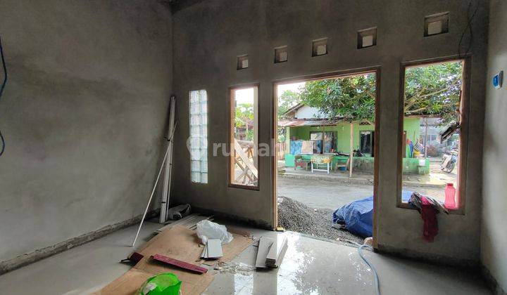 RUMAH CANTIK DAN MURAH DI  TIRTOMARTANI , 4