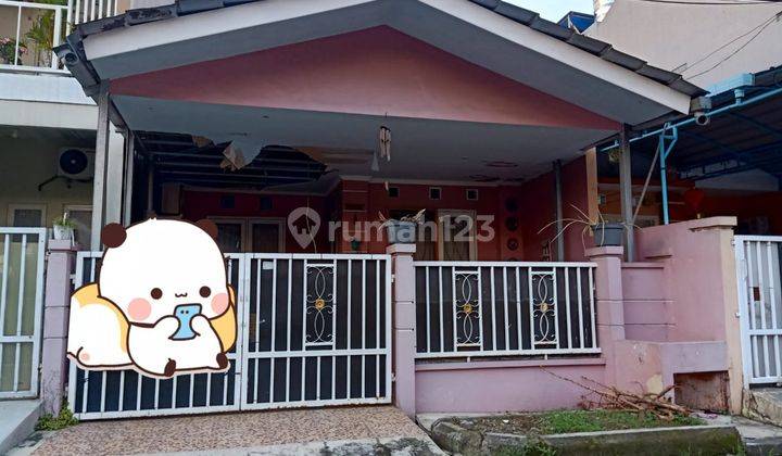 Rumah Pink Harga Miring Lokasi di Boulevard Hijau 72695 Er