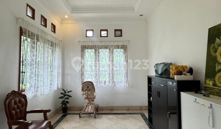 Hunian Asri dengan Halaman Luas di Margonda Raya 2