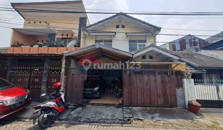 Dijual Rumah 2 Lantai Danau Paiai Sawojajar Carport Luas Perlu Renovasi 1