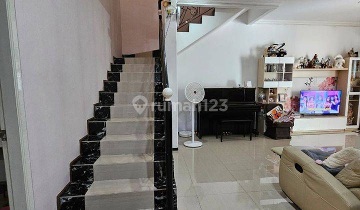 Rumah Taman Mutiara Pakuwon City 2 Lantai Hadap Selatan 2