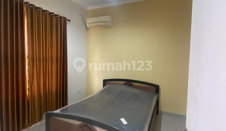 For sale: 2-story house with a view and yard in Sentul City cluster. 2