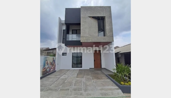 RUMAH DENGAN CARPORT 2 MOBIL PALING MURAH SE TANGSEL RAYA