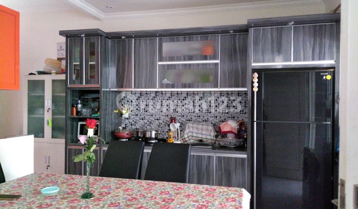 For sale, corner house facing park, 2 floors in Cibubur tourist city. 2