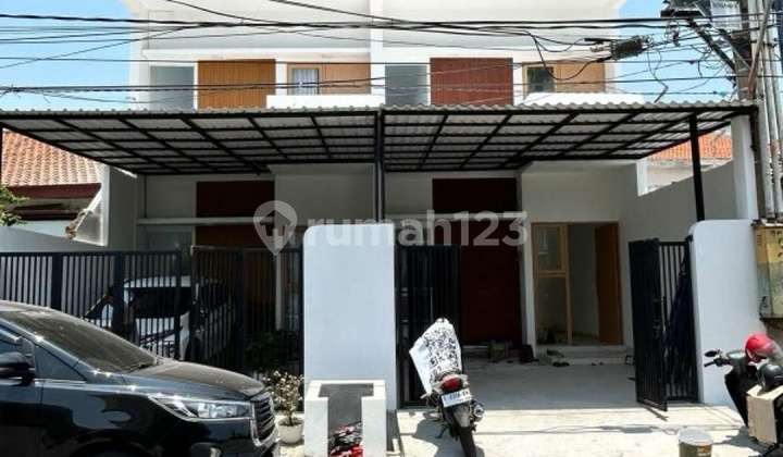 Rumah Rungkut Asri Tengah Surabaya 2 Lantai Hadap Timur