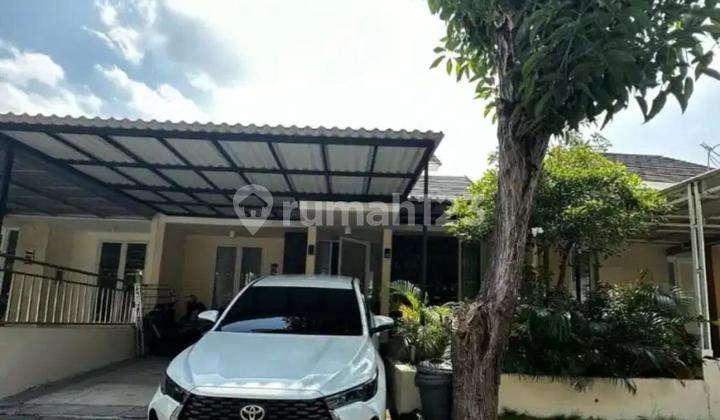 Rumah Taman Puspa Raya Surabaya Hadap Selatan