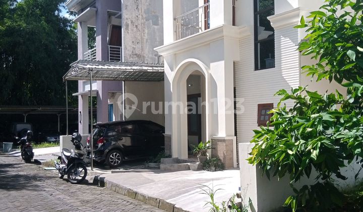 Minimalist House in One Gate System Housing at Jakal Km 9 2