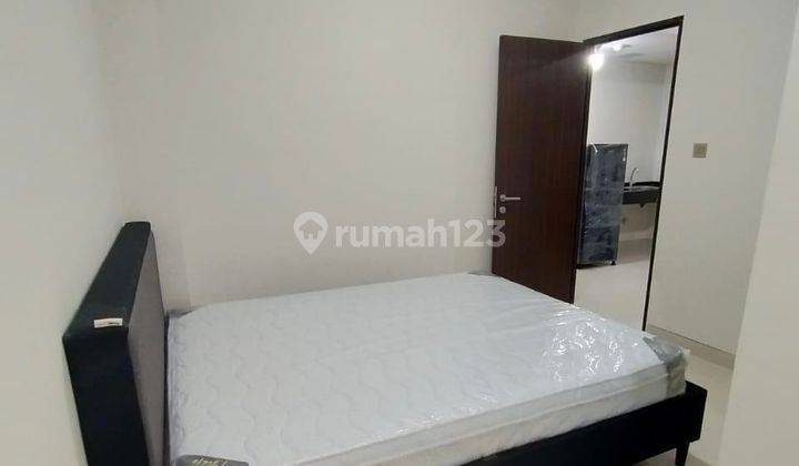 Apartemen Trans Park Cibubur, 2 Bedrooms, view Swimming Pool 2