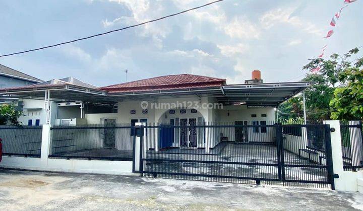 RUMAH MINIMALIS PARKIR LUAS DIPANDAU 2