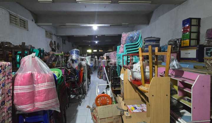 Golden Opportunity for Investment: 2-Story Super House & Shop in the Strategic Slamet Riyadi Area 2