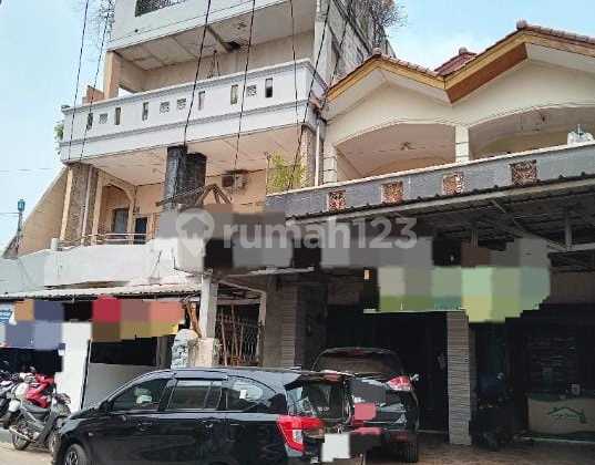 Dijual BU Rumah Toko 3 kontrakan dan 2 ruko di jalan raya gondrong cipondoh