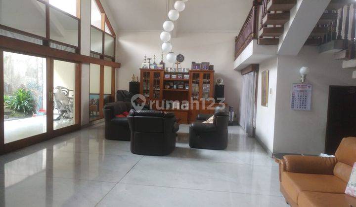 Jual Rumah di Puri Indah  lokasi strategis Cocok untuk komersil , pinggir Jalan raya 1