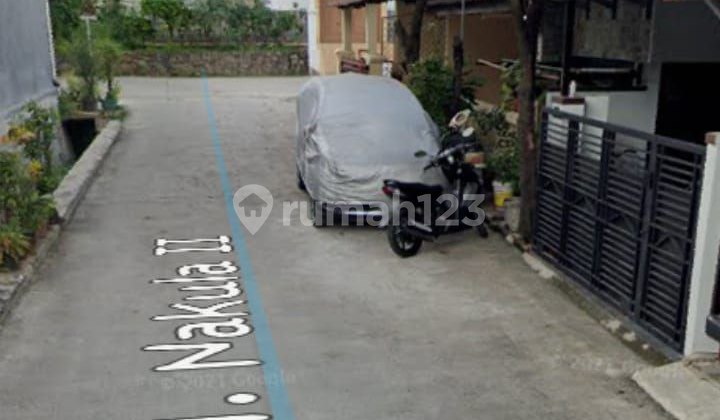 Rumah dalam Kompleks Perumahan Griya Mandala Depok Rumah dalam Kompleks Perumahan Griya Mandala Depok